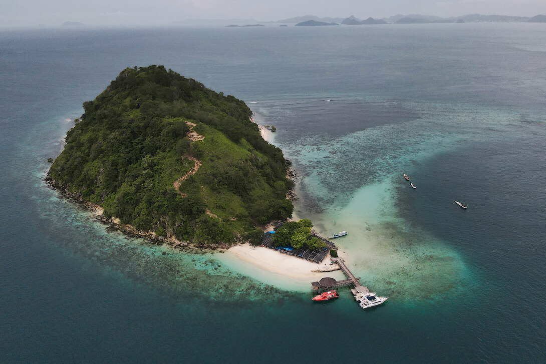 drone shot of the kelor island near komodo day trip indonesia