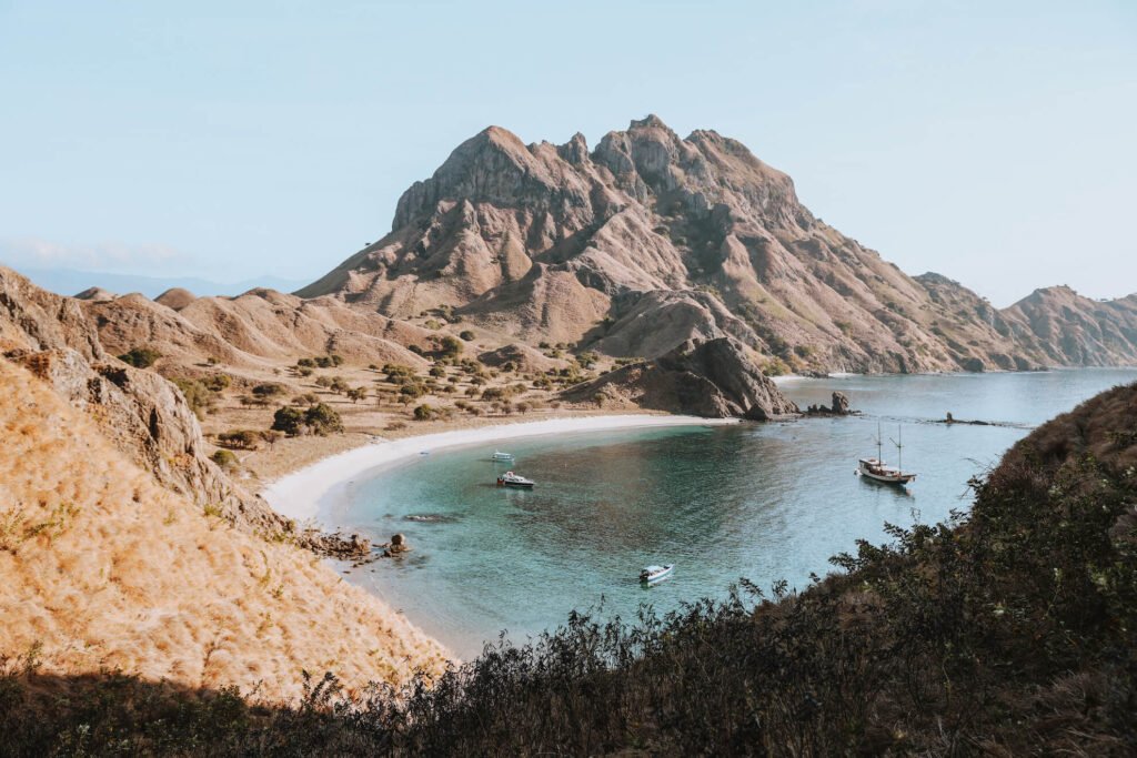 mount padar island coast view with boat komodo trip indonesia